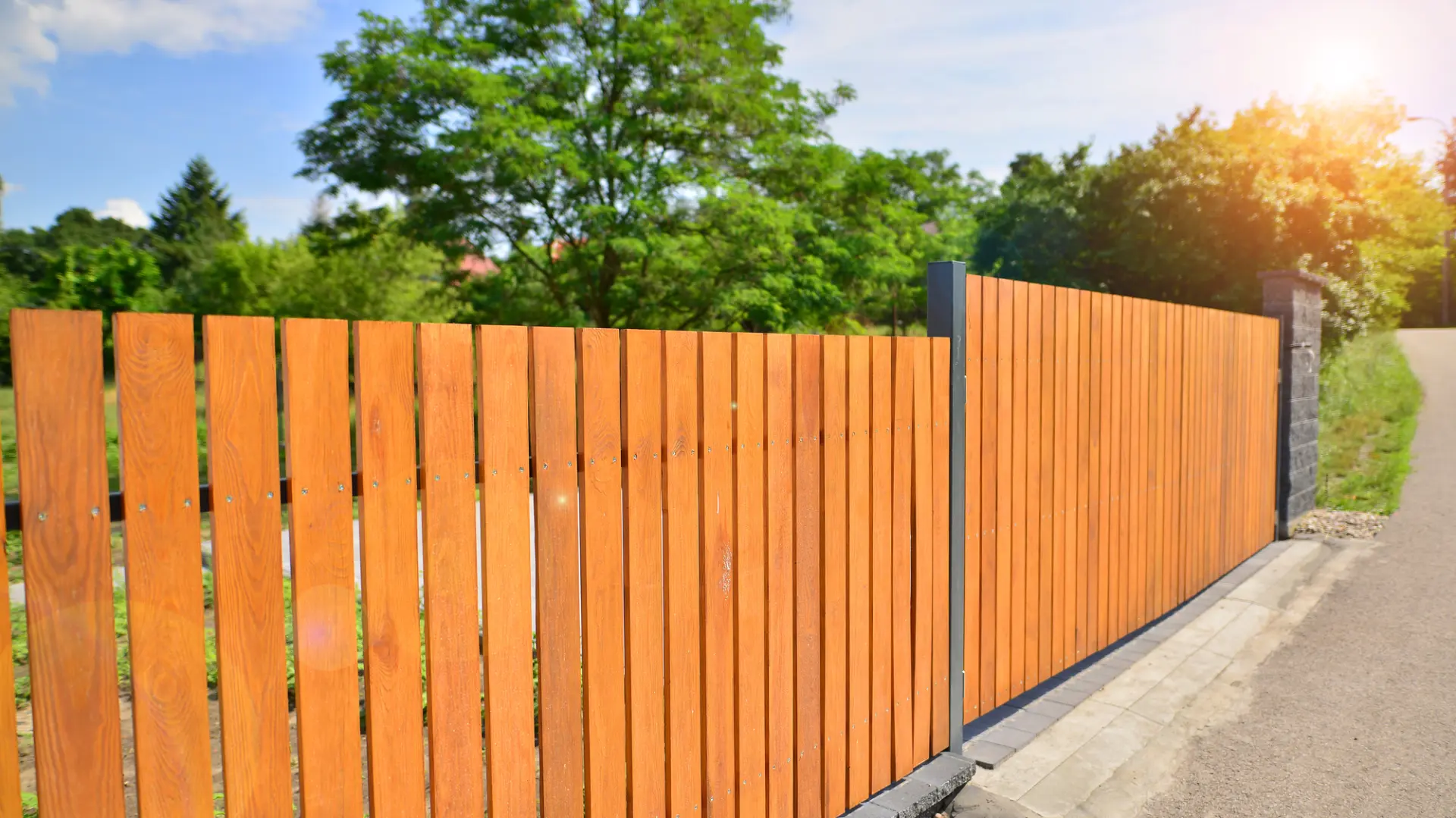 Choosing Between Pressure-Treated and Natural Wood Fencing: What’s Right for Your Home?